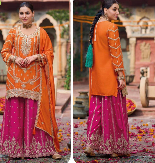 Heavy orange and Rani sharara set