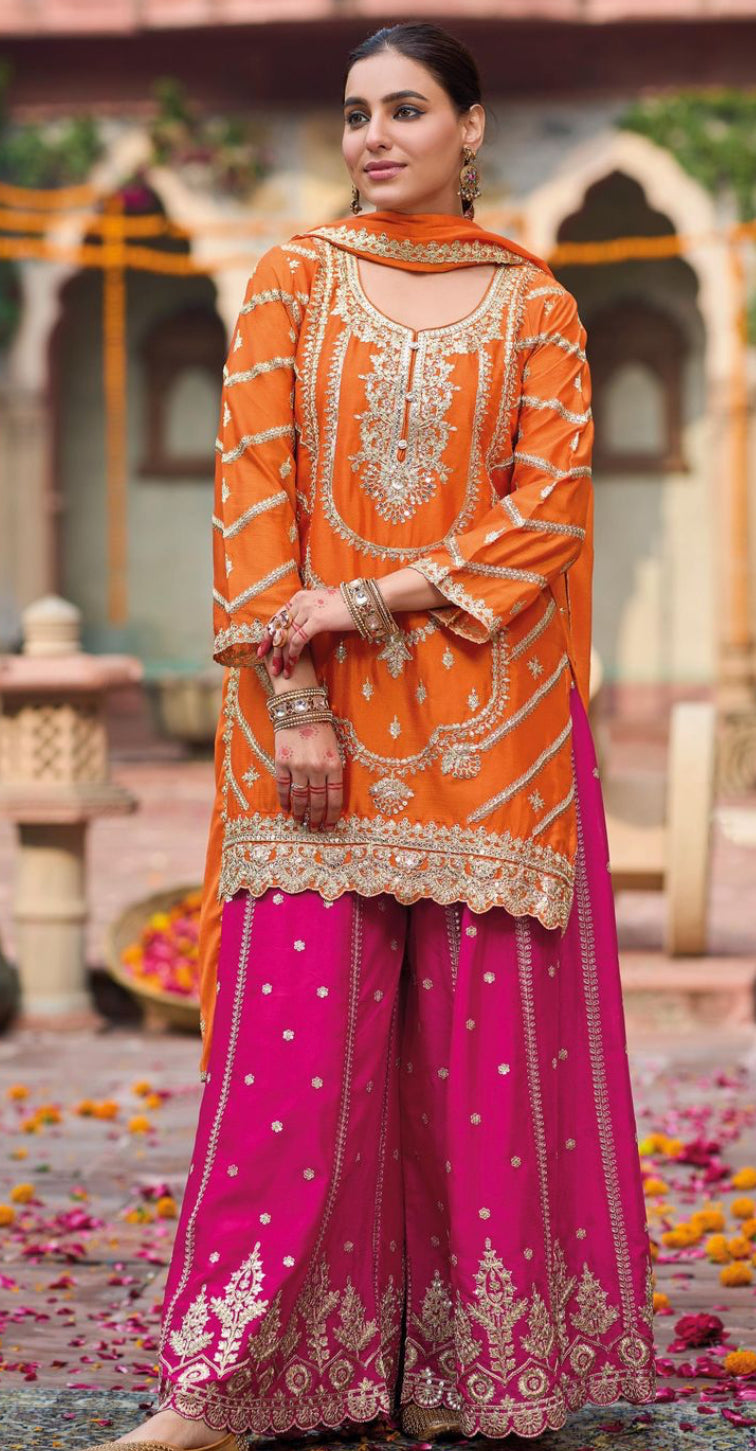 Heavy orange and Rani sharara set